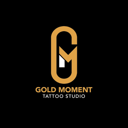 gold moment tattoo studio logo